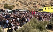 الآلاف يشيعون جثامين ضحايا الهجوم المسلح في الكرك على وقع الترانيم وأكاليل الورد